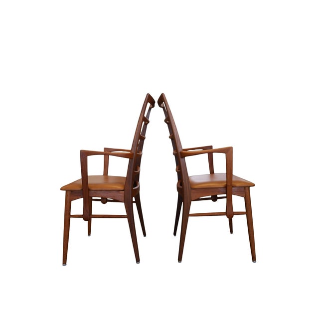 The Liz armchair was designed by Danish furniture icon Niels Koefoed and began production in 1961 by Koefoeds Møbelfabrik...