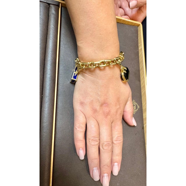 Louis Vuitton Padlock & Keys+ Two Bags Charm Yellow Gold Bracelet 125.7 Gm 18 KG Unisex Comprised of square shaped cable...