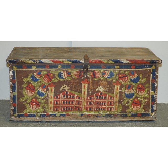 Dtunning, circa 1880 hand painted Romanian clothes trunk or marriage coffer chest depicting a large Church to the front....