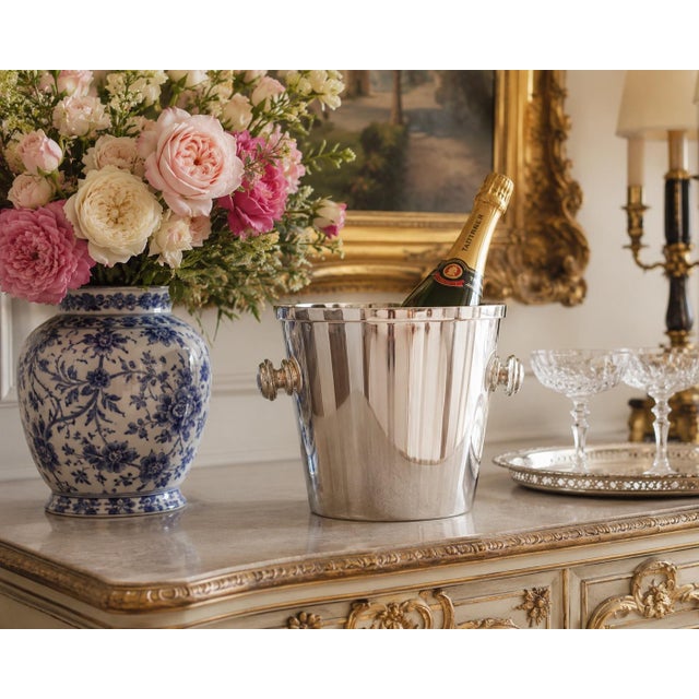 A fabulous Mid-Century French Art Deco style silver plated champagne ice bucket or wine cooler with round knob handles....