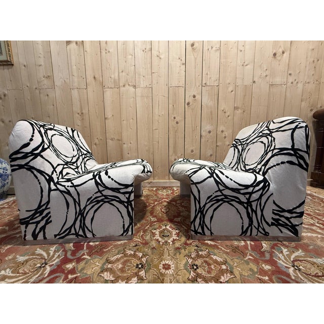 Pair of Alky-Piretti lounge chairs from the 1960s, typical of the era's design with their generous, rounded shapes...