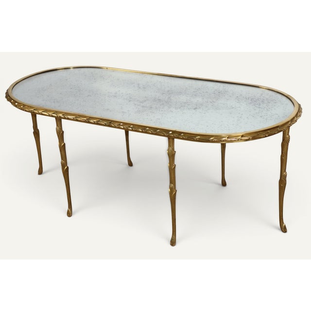Elegant and refined, this oval coffee table, created by Maison Baguès in the 1950s, embodies the grand tradition of French...