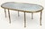 Elegant and refined, this oval coffee table, created by Maison Baguès in the 1950s, embodies the grand tradition of French...
