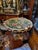 Description: An opulent French porcelain centerpiece bowl, designed in the Rococo revival style. This striking decorative...