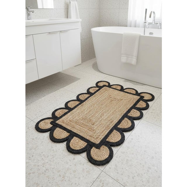 This handcrafted bath rug is made from natural jute, carefully handwoven to highlight the organic texture and durability...
