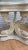 Late 20th Century Vintage Neoclassical Faux-Stone Dolphin Pedestal Table With Glass Top For Sale - Image 5 of 11