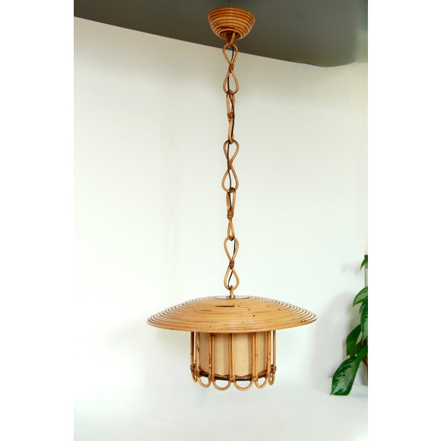 Carta is a stunning ceiling lamp realised in Italy in the early 70s. This elegant lamp was finely hand-crafted by expert...