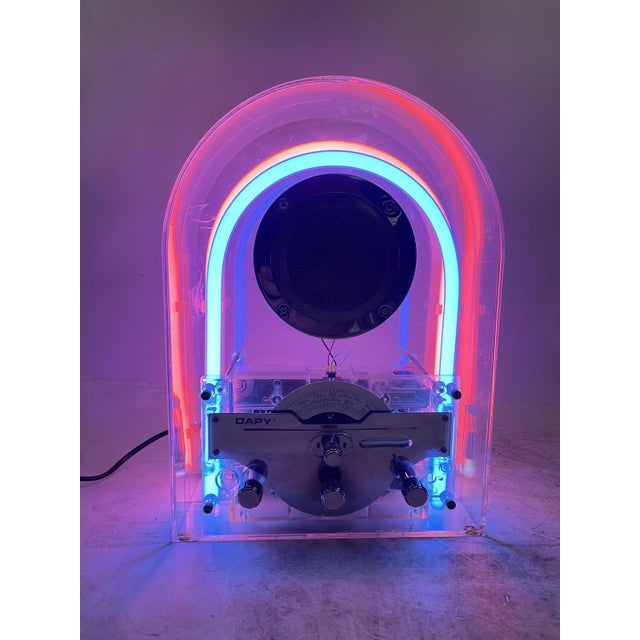 Beautiful French design radio from the 80s in transparent acrylic glass with exposed neon and electronics. Light and radio...