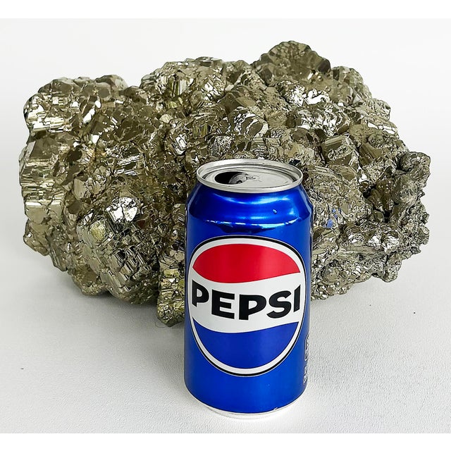 Peruvian Pyrite Cluster Specimen Weighing 44 Pounds Offered for sale is a large specimen of Peruvian Pyrite that weighs 44...