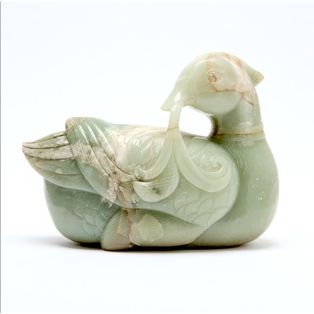 A large and exceptionally substantial solid Chinese celadon jade figure of a mandarin duck, Republic Period, early 20th...