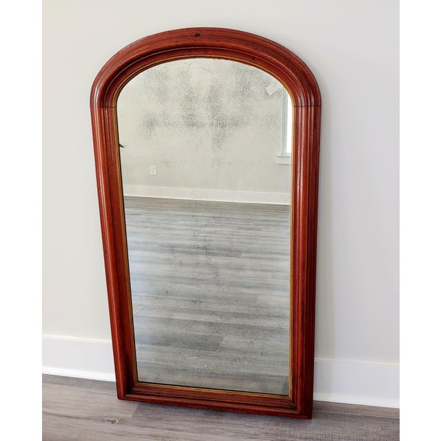 A period 19th century Louis Philippe mirror unique to be left in its natural wood finish. It has it original mercury glass...