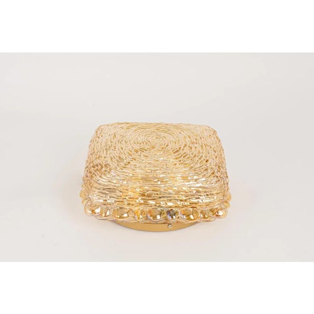 1 of 2 amber glass sconces/ or flush mount light in thumbprint shape, germany, 1970s very good condition. Cleaned, well-...