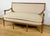 This magnificent three-seater bench in stained beech is a remarkable example of the Louis XVI style, dating from the...