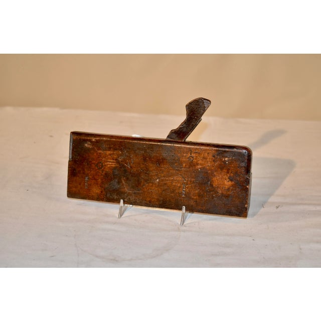 19th century molding plane made from beech wood. The plane is stamped with the name MIKE. Imagine the moldings this plane...