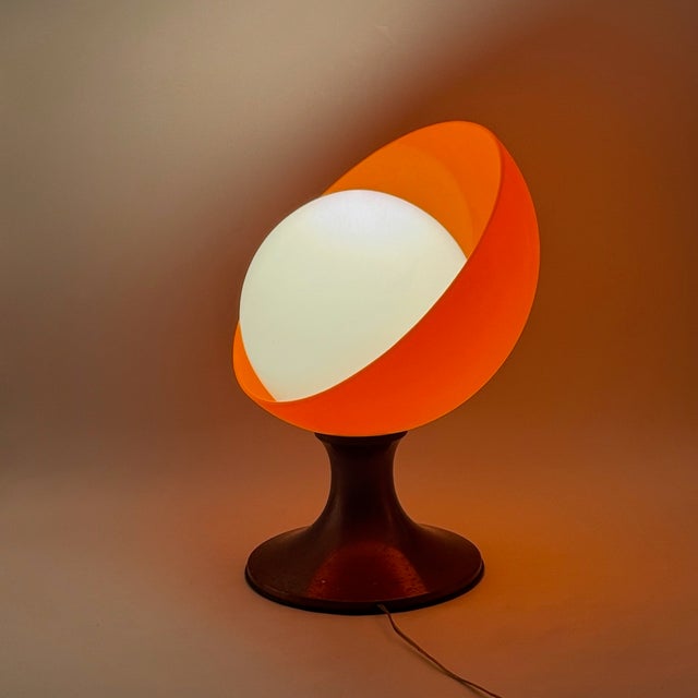 This large italian table light is a bold example of space age design from the 1970s, a period defined by experimental...