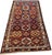 An antique Kurdish Tribal Rug with Caucasian Moghan pattern. This rectangular area rug features a geometric panel design...