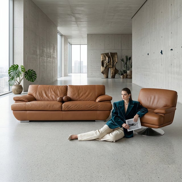 A sculptural leather seating set reimagined through a refined LOOM studio process. This sofa and lounge chair have been...