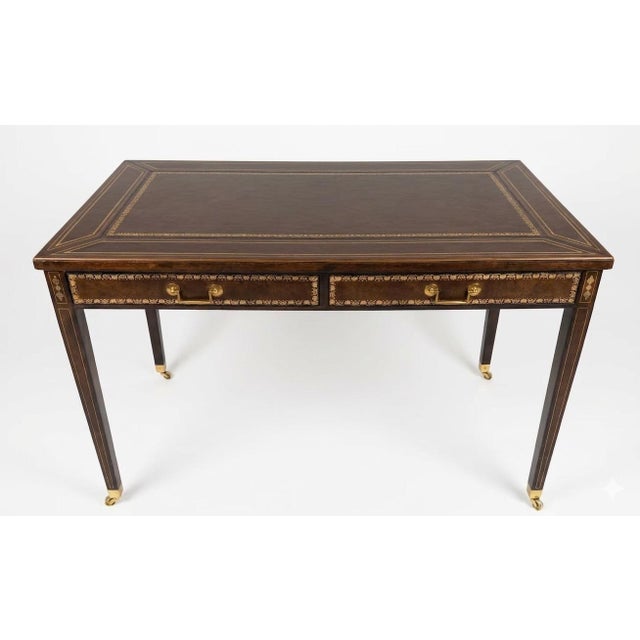 Impressive Maitland-Smith Leather Writing Desk, Louis XVI style with Elegant Tapered Legs and lovely Brass Casters....