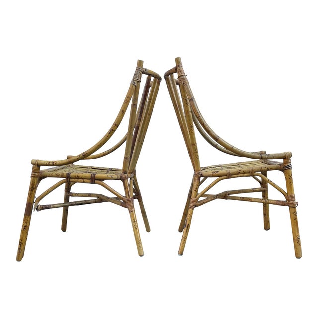 Very unique identical pair or bamboo side chairs