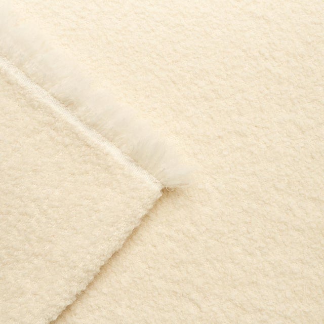 Woven in Italy, Oskar Alpaca Wool Bouclé derives its ultra-soft texture from a luxe blend of Peruvian alpaca, virgin wool...
