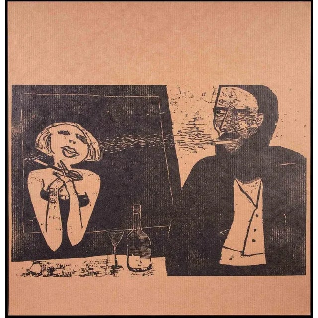 A Man and a Woman is an original woodcut print realized by an unknown artist of early 20th century. Very good condition on...