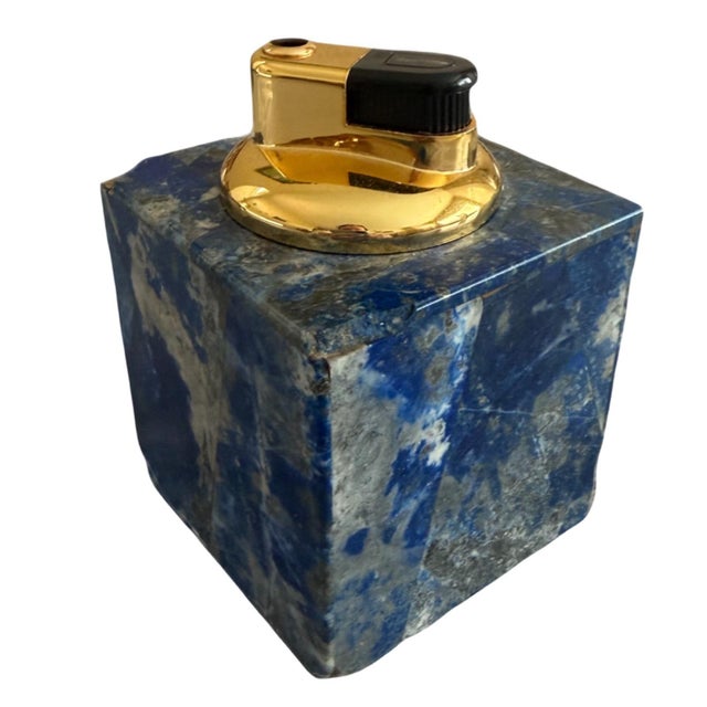Vintage Lapis Lazuli table lighter. Will need a replacement insert or lighter fluid. Small chips at four of the corners....