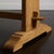 A French dining table from the 1970's finished in a bleached oak. The table features a trestle style base with a chunky...