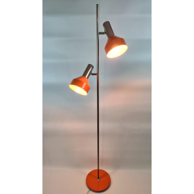 An original floor lamp from the 1960s–1970s, designed in the mid-century modern/space age style. Model with two...