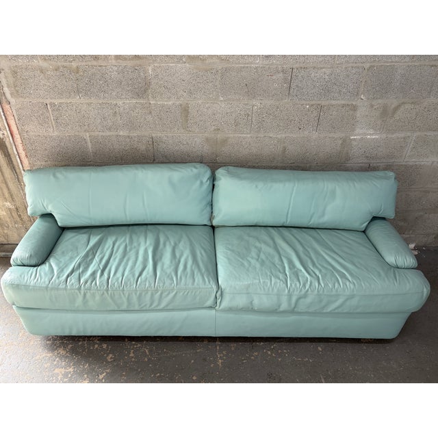 Vintage Postmodern Teal Leather Sofa by Directional Furniture. Circa 1980s. Features a quintessential 1980s postmodern...