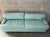 Vintage Postmodern Teal Leather Sofa by Directional Furniture. Circa 1980s. Features a quintessential 1980s postmodern...