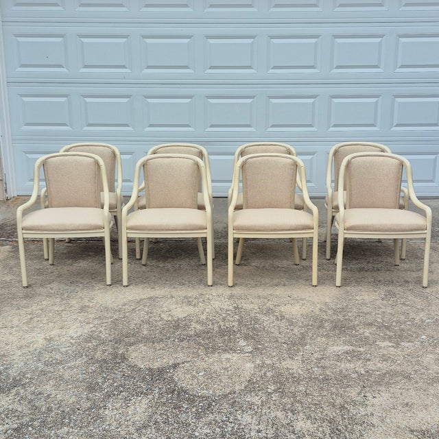 This is a rare set of 8 postmodern cream painted and upholstered bentwood dining arm chairs. The chairs are unsigned but...