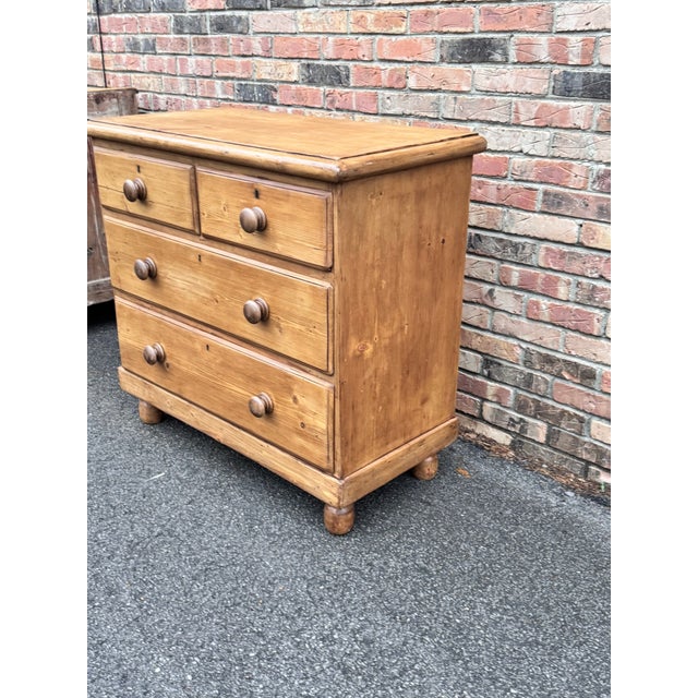 This is a lovely antique pine chest! This piece dates to the 19th century and has lovely patina. The wood has a warm glow,...