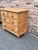 This is a lovely antique pine chest! This piece dates to the 19th century and has lovely patina. The wood has a warm glow,...