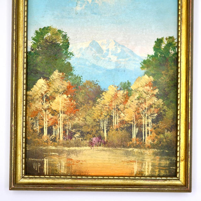 This exceptional mid-century miniature oil painting captures a serene, atmospheric autumn scene in the Colorado Rocky...