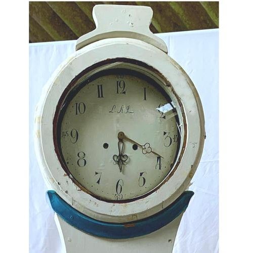 Swedish country Mora clock from early 1800s in white paint finish and blue detail with a Classic shape body and a good...