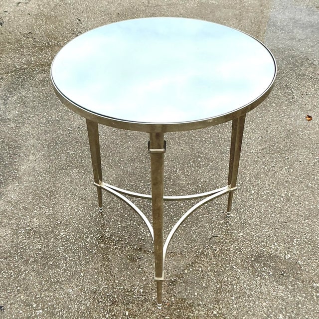Add a touch of refined glamour to your space with this Vintage Regency Mirror and Polished Nickel Side Table. This elegant...