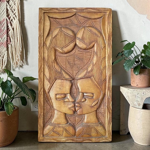Gorgeous piece, there are no hangers on the back, can just be rested against the wall, or attach your own hanger. In...