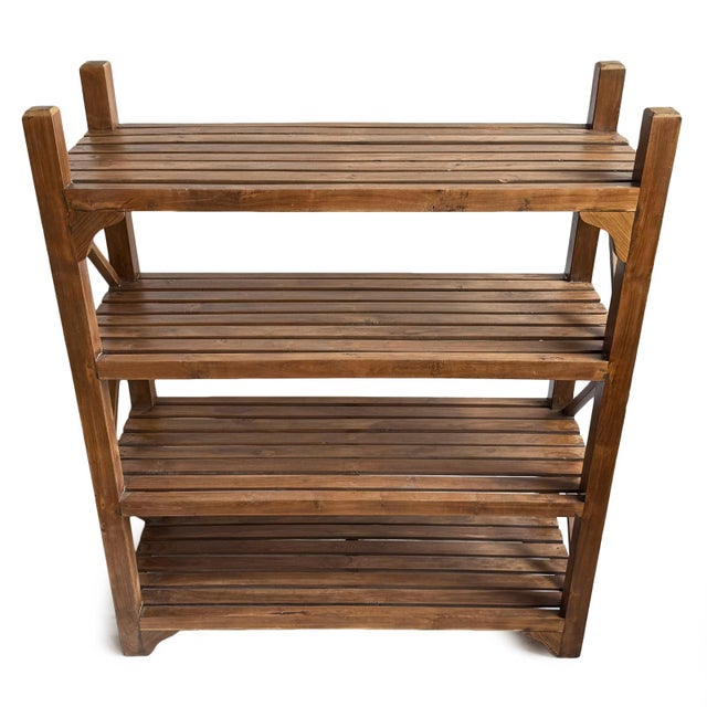 Vintage farmhouse style teak wood storage / display shelf. Natural wood finish. Each will vary in natural tones, grain,...