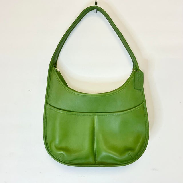 The Ergo Hobo is one of Coach’s iconic, high-in-demand vintage shoulder Handbags. We curated this one from an Estate that...