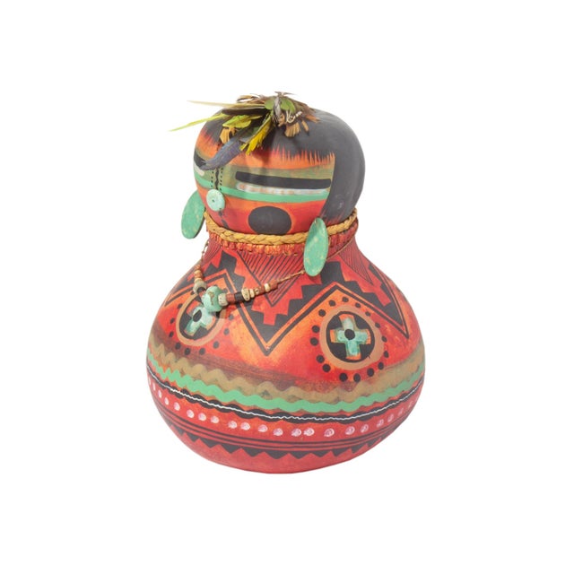 A 1984 gourd sculpture, titled "Pre-Historic Kachina," by American artist Robert Rivera. Made from a gourd, this sculpture...