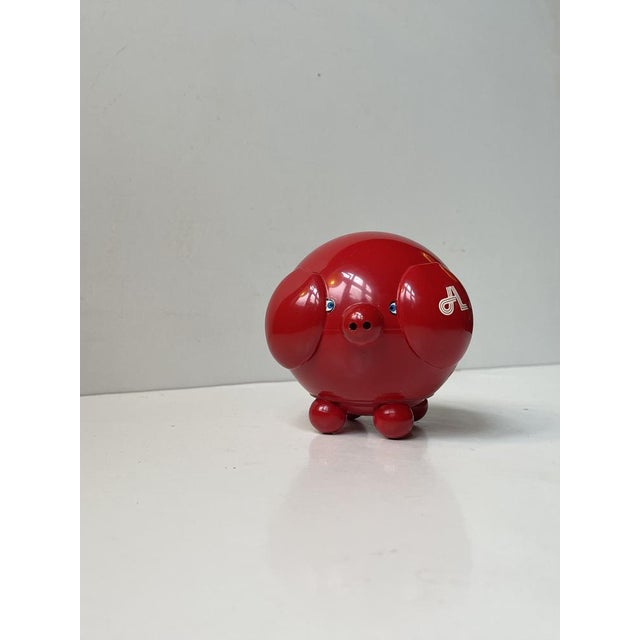 A small rare money bank in the shape of this little red pig designed by hans gustav ehrenreich in denmark in 1968. It is...