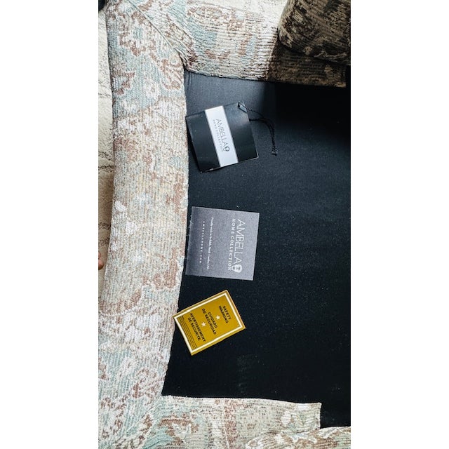 Ambella Slipper Lounge Chair and Ottoman with hints of greens and browns in the designer-patterned upholstery fabric;...