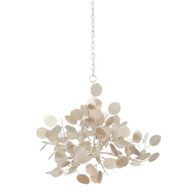 With a lyrical profile of fluttering discs that favor the leaves of its namesake plant, the Lunaria Chandelier is made of...