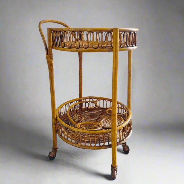 1960s gorgeous bamboo & rattan serving bar cart trolley by franco albini. Made in italy. This exquisite serving cart is a...