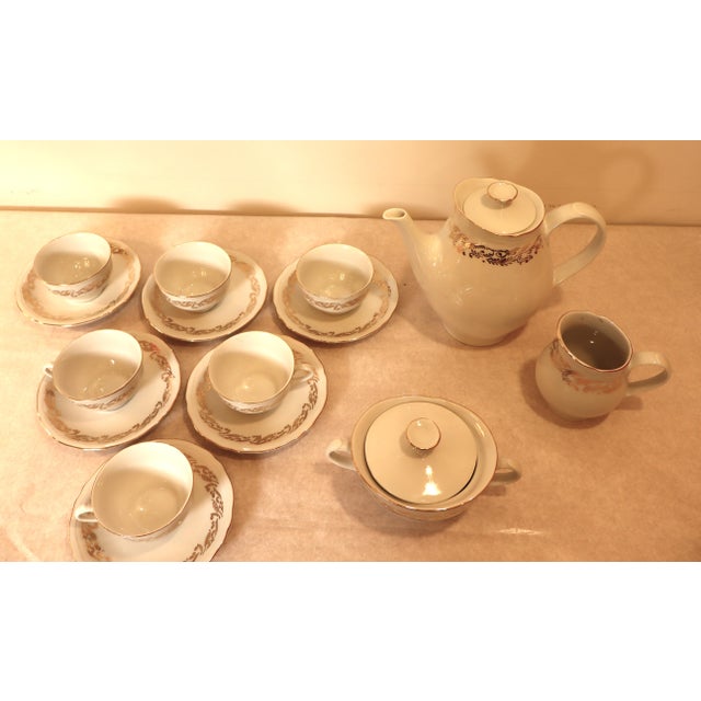 A six-piece coffee set from the renowned Richard Ginori Porcellane Ariston. The set includes six cups and saucers, a...