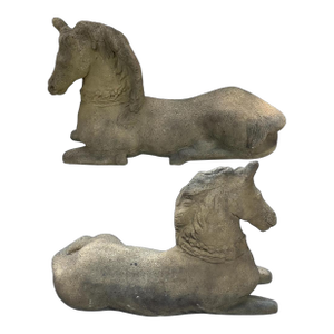 Four Vintage Cast Stone Recumbent Horse Garden Statues.
