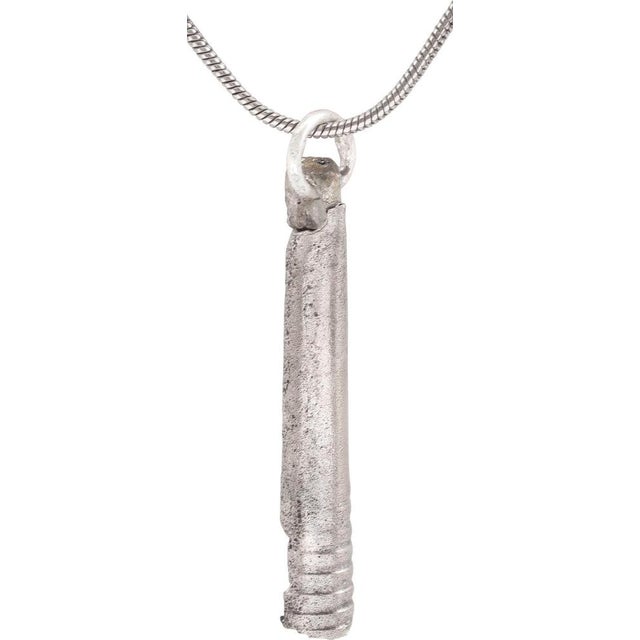 Danelaw England. Silvered bronze, about 1 1/3" (1.35”) of elongated conical form with butted seam, 7 decorative rings to...