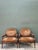 This pair of vintage Isenhour fauteuil armchairs combines carved walnut frames with patterned velvet upholstery. Each...
