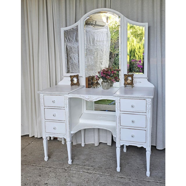 Beautiful Make up vanity table with 3 way mirror . This Romantic piece of furniture was manufactured during the 1930's ....