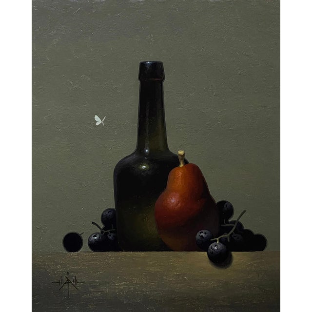 Red Anjou & Green Glass by Blair Atherholt | Oil on panel Still life of a bottle, pear, and grapes For Sale
